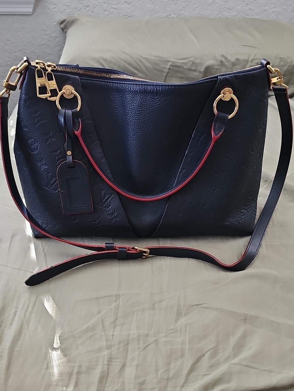 Louis Vuitton Black Shoulder Bag with Red Trim and Gold Hardware